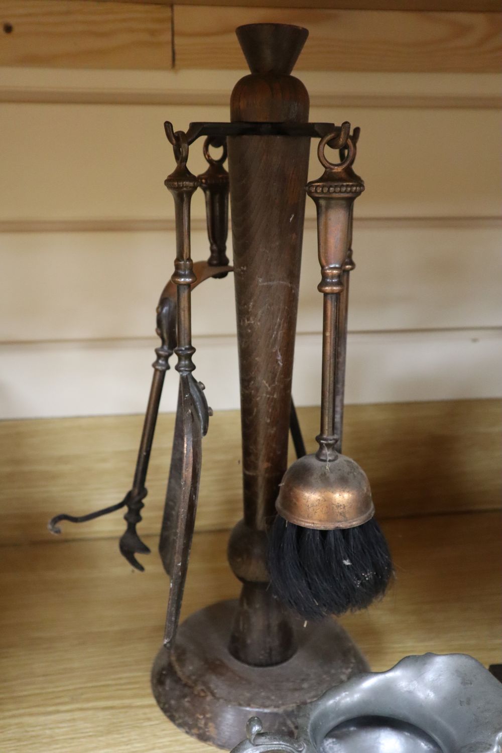 A Merryweather painted leather fire bucket, 11in. and an assortment of domestic utensils (13)